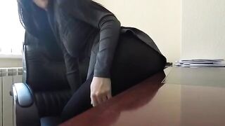 Mini Diva caresses herself in the office, risking exposure