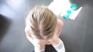 A sweet girl is having fun with a nice guy at the gym
