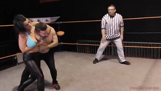 Nadia White, the busty brunette MILF, dominates her man in a fierce wrestle match