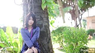 The Asian girl has sex in the garden and squirts