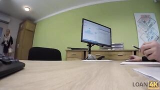 A business lady is trying to get a loan from the bank to improve her business