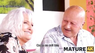 A hot mature woman gets fucked on the table by a guy