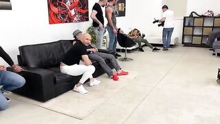 Monika Fox gets fucked hard in every hole by 7 cocks backstage