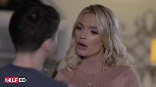 A hot stepmom is getting wild in the living room, craving some action