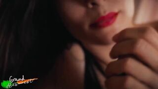 A hot step mom with red lips fucks with her stepson in a steamy scene