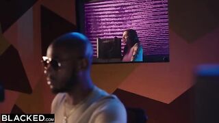 The singer Keisha has a steamy session with a record producer in a studio