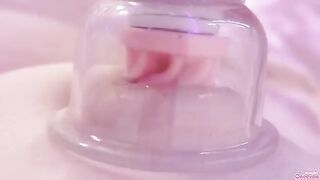 A girl plays with her nipples and clit using a toy in this exclusive content