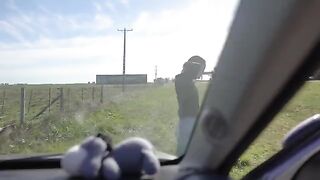 A teen gets horny on a road trip and sucks her guy’s cock