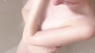 We shower, massage each other, and have sex over the couch in an intimate scene