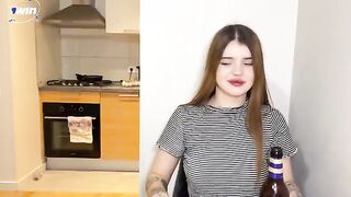 A cum shot on the face of a hot tattoo girl
