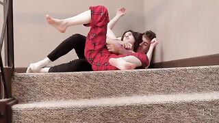 A sexy girl has sex with her stepbrother on the stairs