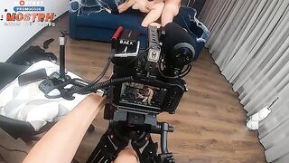 Behind the scene with a blondie and her fake big boobs
