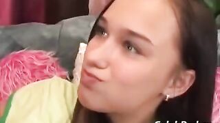 A cute teenager is having sex with an adult man