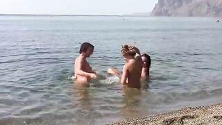 Three erogenous points on a public beach without clothes