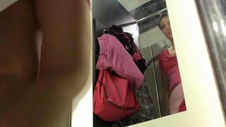 The peeping guy filmed a girl undressing in the locker room of the shop