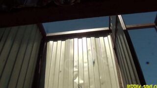 A woman was secretly filmed in a beach cabin, showcasing unexpected moments