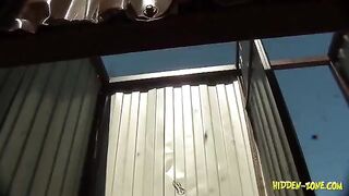 A woman was secretly filmed in a beach cabin, showcasing unexpected moments