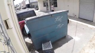 Girl was photographed while having sex behind the garbage tank