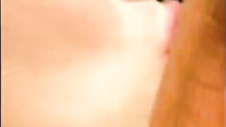 A man cum on the face of his girlfriend near the pool