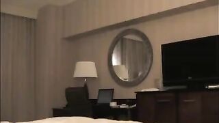 A man checks the girl in the hotel and undresses her