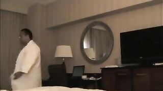 A man checks the girl in the hotel and undresses her