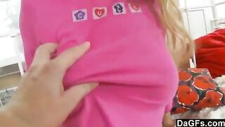 A cute young girl plays with her panties before masturbating on the bed
