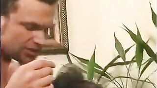 A 40-year-old guy playing a joke, touching the girl's nipples