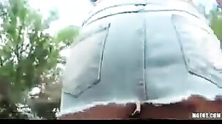 Street masturbation of a hot brunette with a camera in the shot