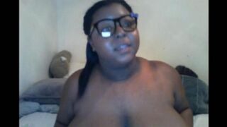 The black woman closed the camera with her big natural milking tits