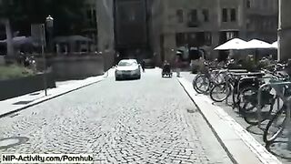 The girl shows her pussy to all the people on the street
