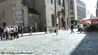 The girl shows her pussy to all the people on the street