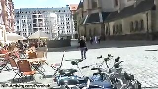 The girl shows her pussy to all the people on the street