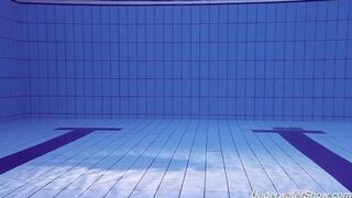 Nude swimming in the pool with a captivating view of Helen