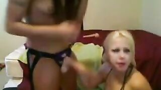 A blonde with big boobs fucks in a webcam chat, using a strapon for intense action