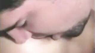 A guy fucks his strapon while the second girl fingers him
