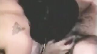 A guy fucks his strapon while the second girl fingers him
