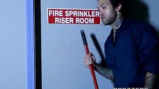 A beautiful babe has sex with a cleaner in the back room