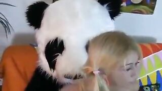 A cute blonde woman has sex with her favorite bear in a passionate act