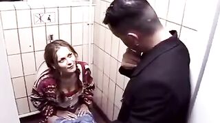 A young couple has sex in the toilet of the night club