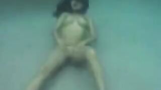 Busty brunette beauty gets fucked under the ocean waves in hot POV action