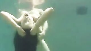 Busty brunette beauty gets fucked under the ocean waves in hot POV action