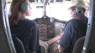 The guy is fucking with hot stewardess with huge boobs