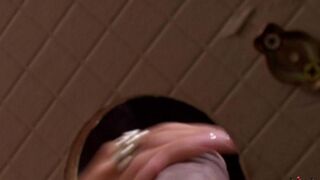 A beauty got a dick in her mouth through the toilet hole