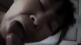 The Chinese woman practices blowjob with her mouth