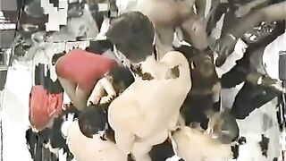 A crowd of people fucked a young woman with big tits