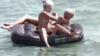 A naked girl is having fun on the mattress, it's hot!