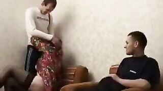 A mature woman fucked by her son's friend in the hotel room