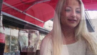 A blonde with natural tits has sex on camera