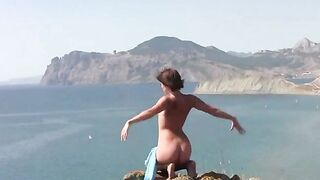 A girl is showing her body on the beach