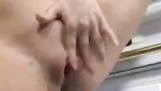 A cum shot in the kitchen with a pregnant brunette woman